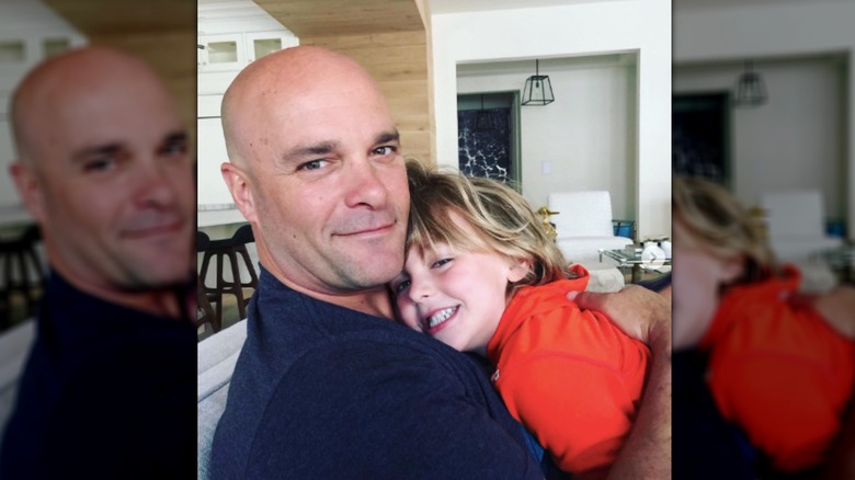 Bryan Baeumler holding Lincoln Baeumler