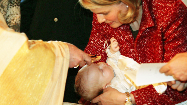 Prince Gabriel gets baptized as a baby.