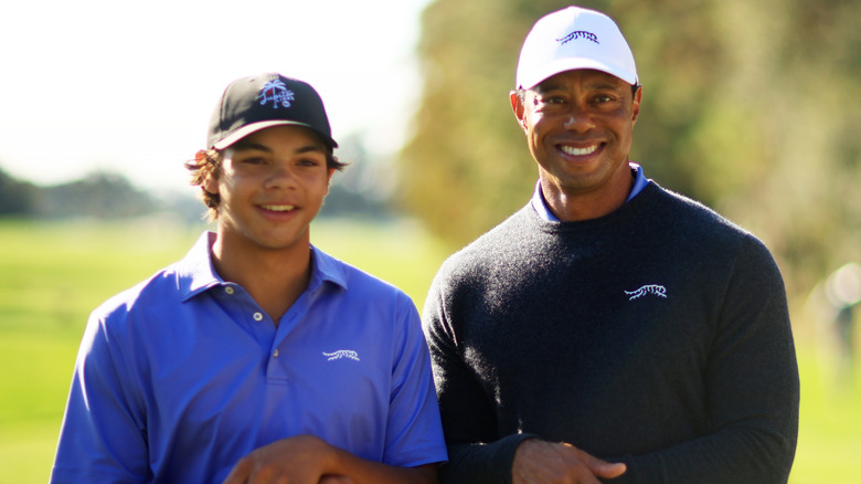 Charlie Woods and Tiger Woods smiling together