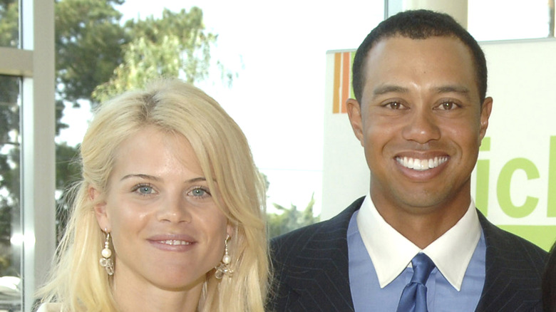 Elin Nordegren and Tiger Woods smiling