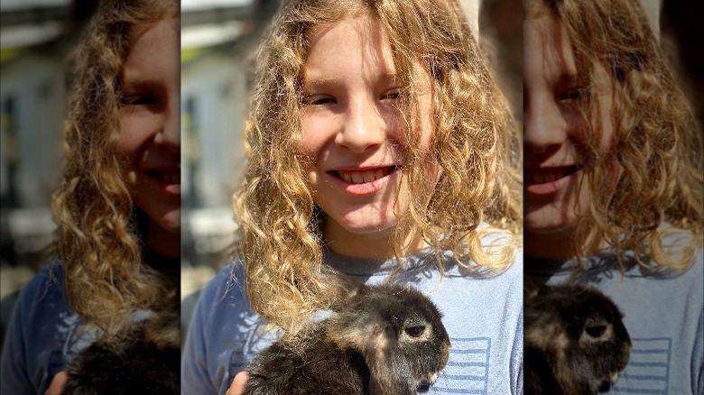 Finn Davey McDermott posing with rabbit