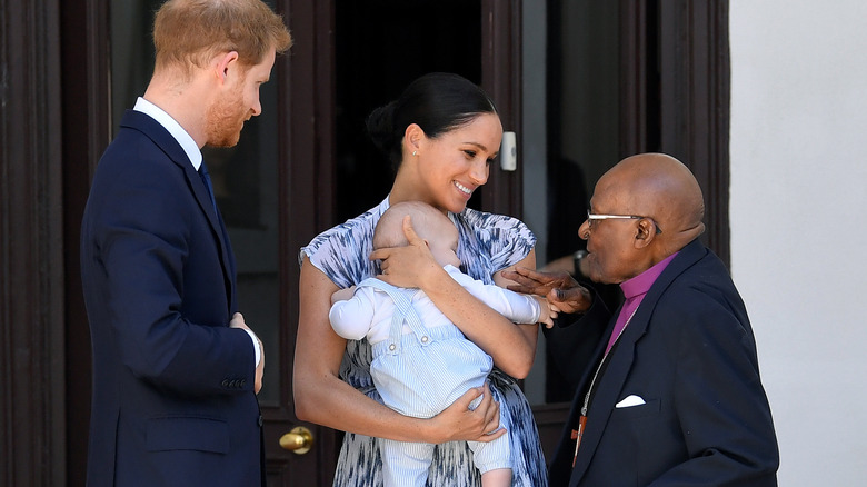 Prince Harry, Meghan Markle, Archie, and Archbishop Desmond Tutu