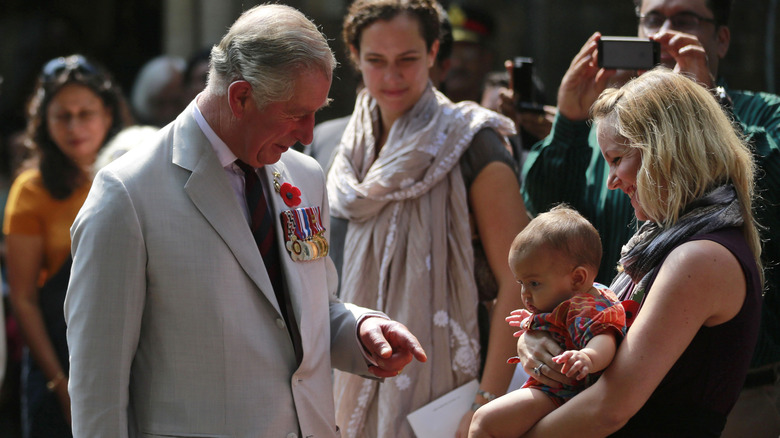 Prince Charles meeting woman's baby