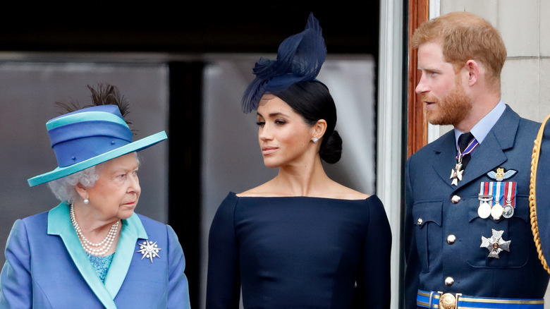 Prince Harry and Meghan Markle with Queen Elizabeth. 