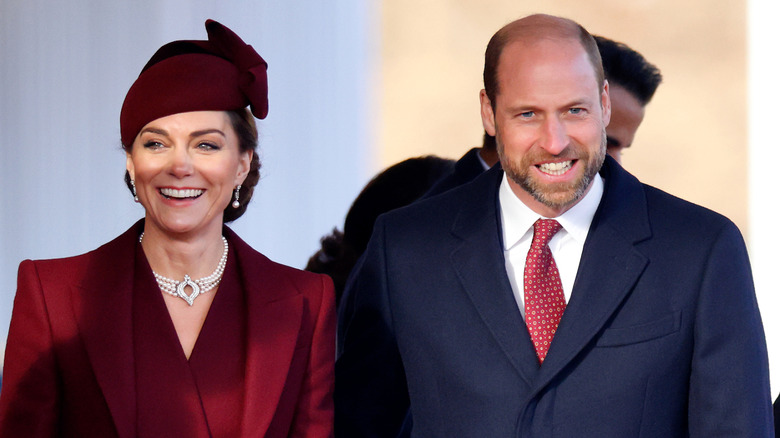 Kate Middleton and Prince William walking together.