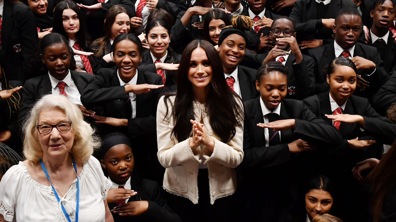 Meghan Markle with school children