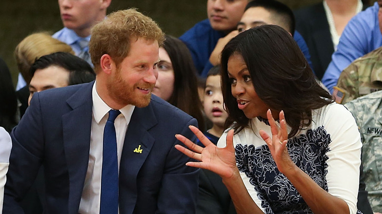 Michelle Obama talking to Prince Harry