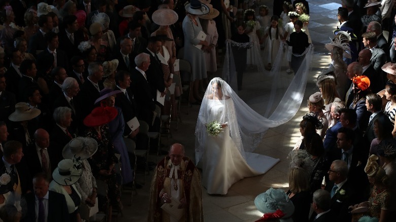 Meghan Markle walks down the aisle by herself at her wedding