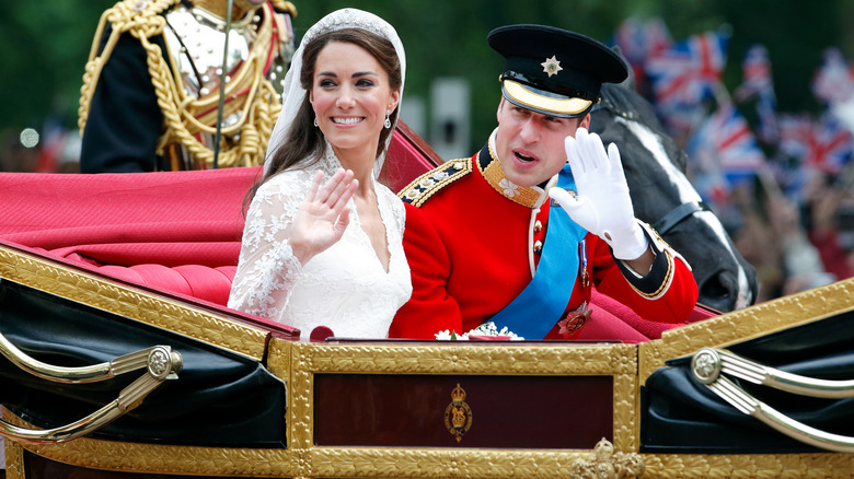 William and Kate in their wedding carriage