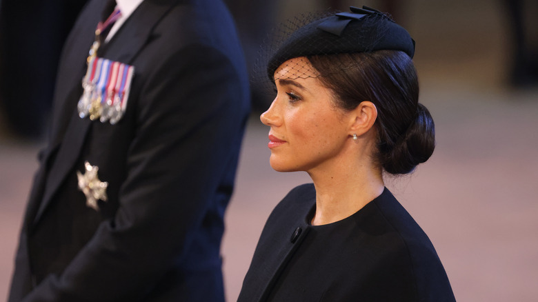 Meghan Markle in profile at service for Queen