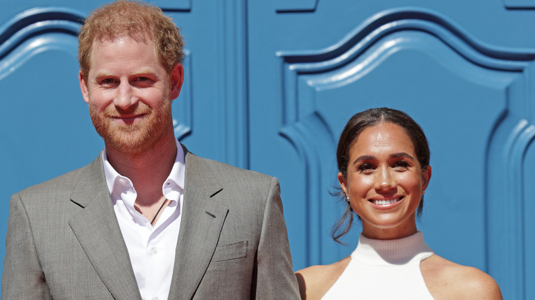 Prince Harry and Meghan Markle smiling