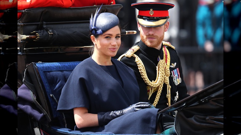 Meghan Markle in carriage with Harry 