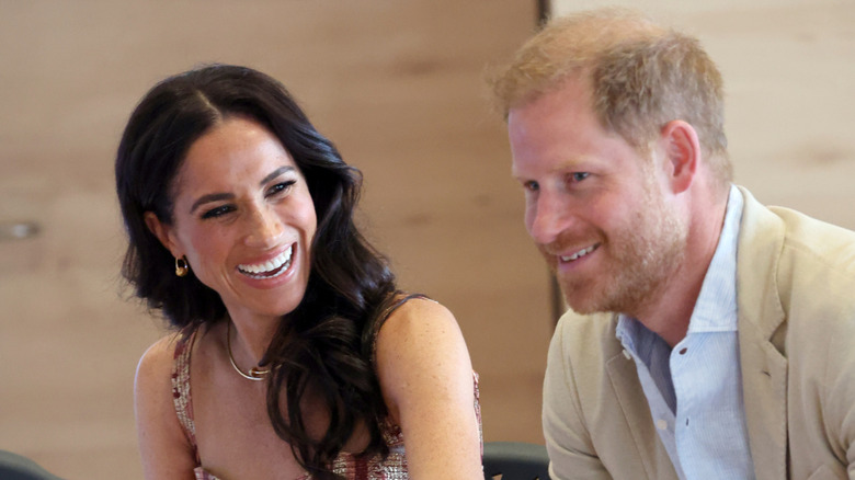 Meghan Markle looking at Prince Harry