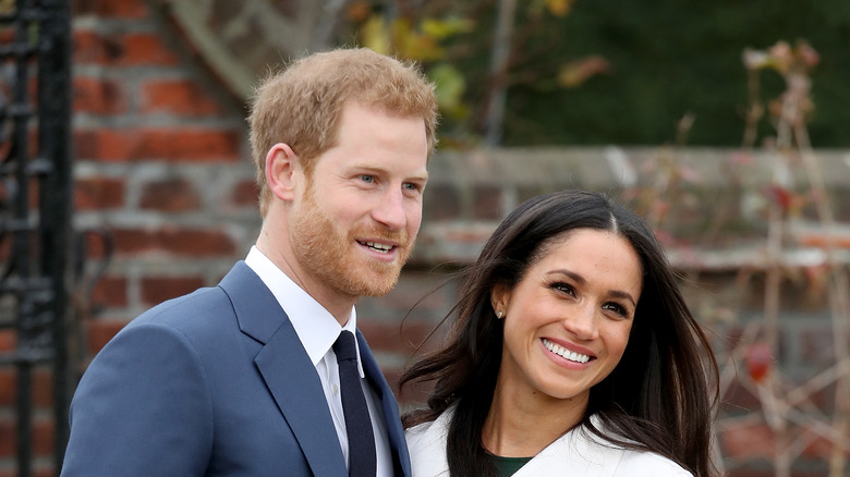 Meghan Markle and Prince Harry smiling 