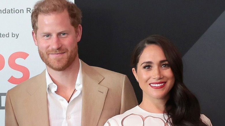 Prince Harry and Meghan Markle smiling together