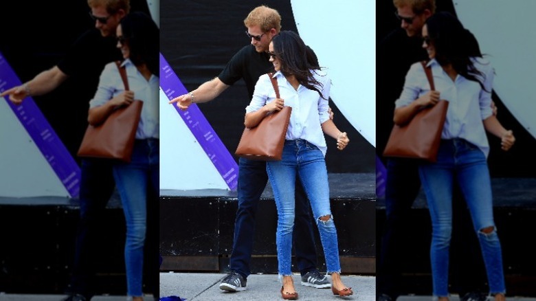 Prince Harry and Meghan Markle looking at something