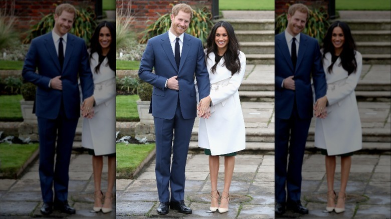 Prince Harry and Meghan Markle smiling