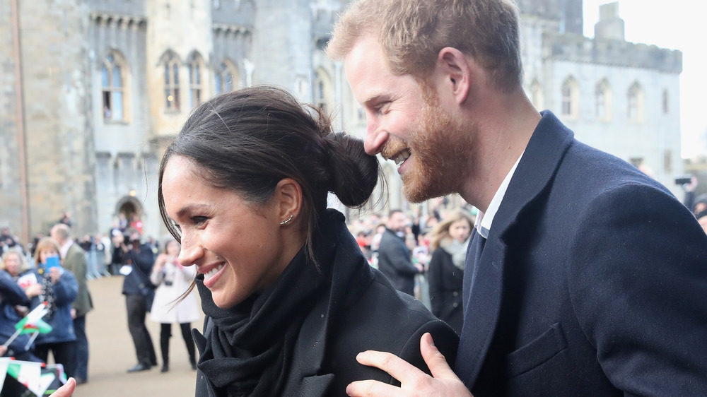 Meghan Markle and Prince Harry smiling