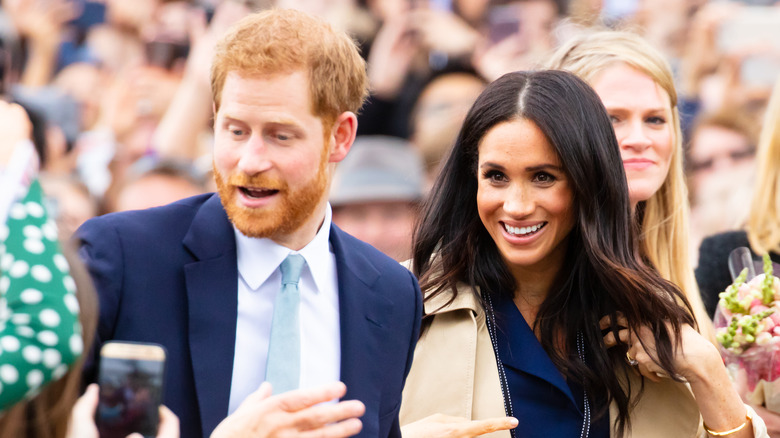 Prince Harry and Meghan Markle in crowd