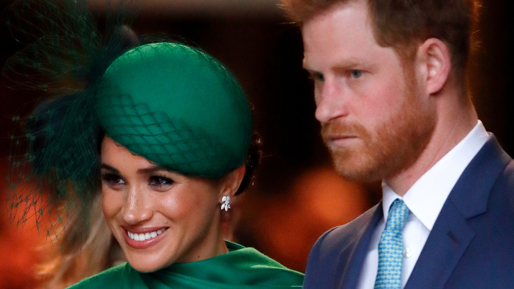 Meghan Markle and Prince Harry standing