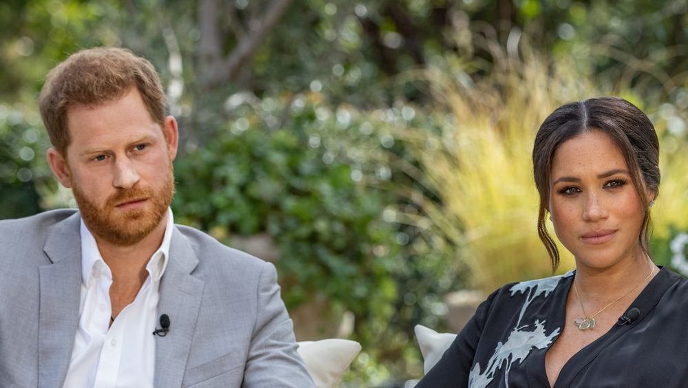 Meghan Markle and Prince Harry sitting