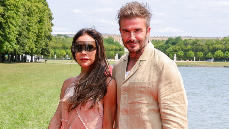 Victoria and David Beckham smiling