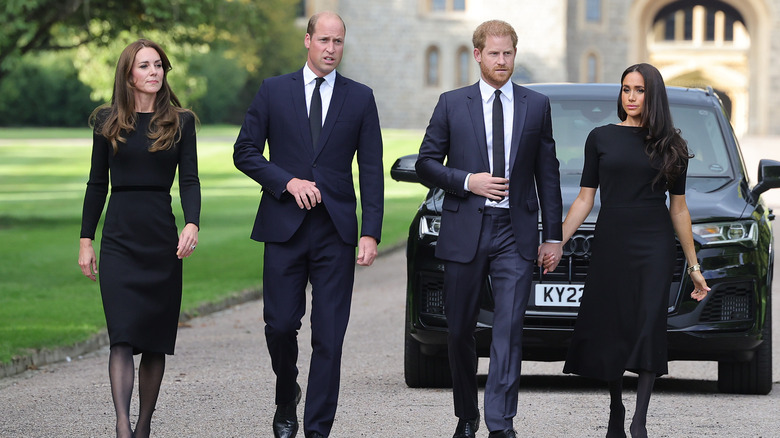 Kate Middleton, Prince William, Prince Harry and Meghan Markle walking