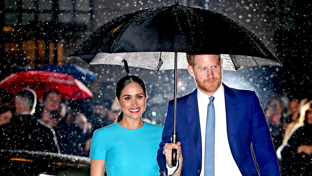 Meghan and Harry smiling