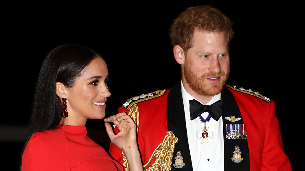 Meghan and Harry smiling