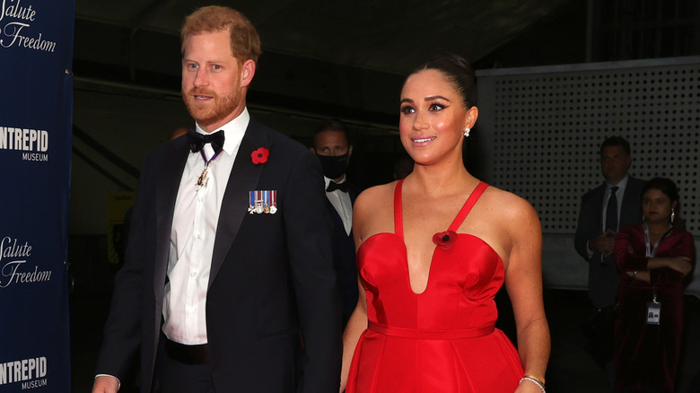 Meghan Markle walking with Prince Harry at the Salute to Freedom Gala