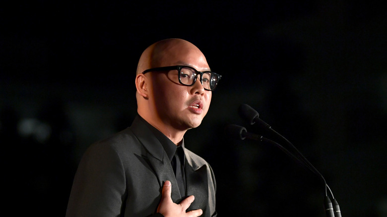 Daniel Martin in 2019 speaking at an event wearing black suit