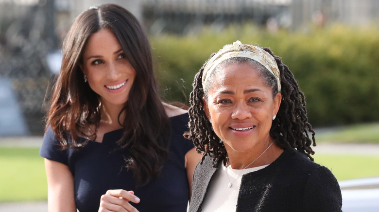 Meghan Markle and Doria Ragland posing 