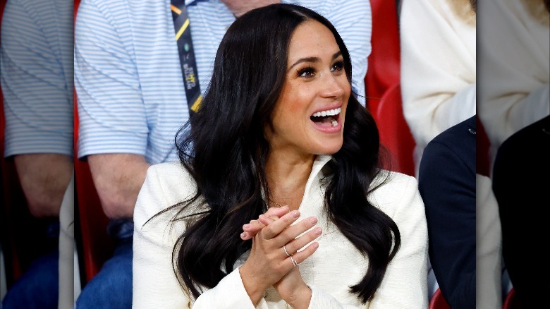 Meghan Markle showing off the ring 