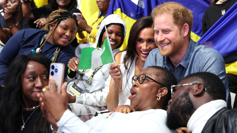 Megan Markle and Prince Harry with Nigerian fans