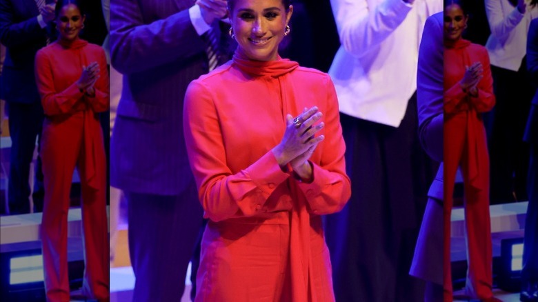 Meghan Markle in a red jumpsuit at One Young World Summit