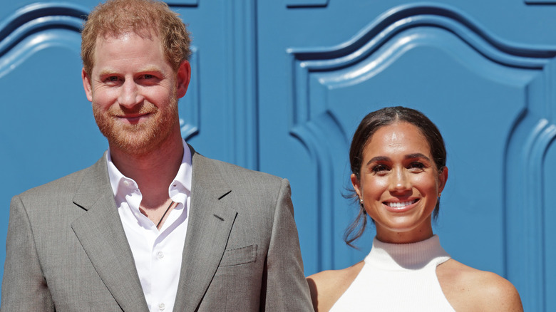 Prince Harry and Meghan Markle smiling