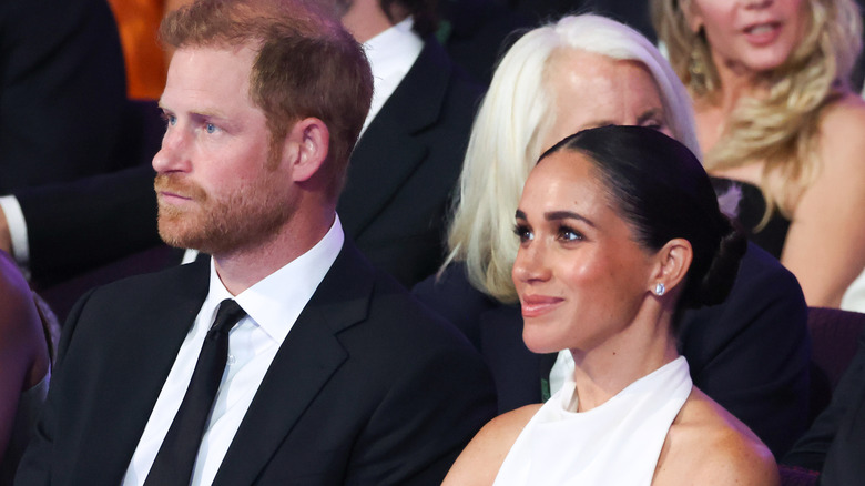 Meghan Markle in white suits