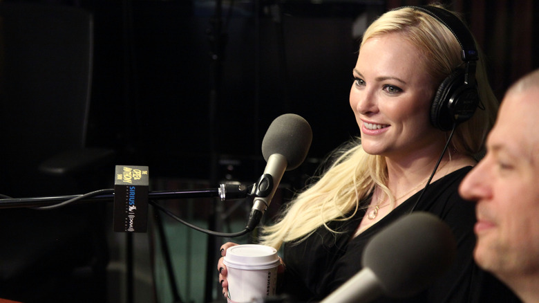 Meghan McCain smiling with microphone