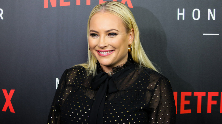 Meghan McCain on red carpet with her hair slicked back