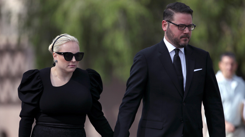 Meghan McCain and Ben Domenech walking together