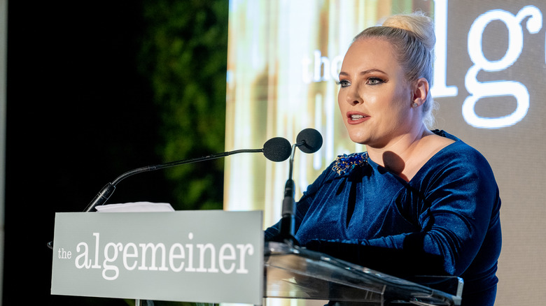 Meghan McCain speaking into a microphone