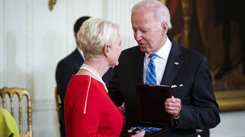 President Joe Biden honoring Cindy McCain with the Presidential Medal of Freedom