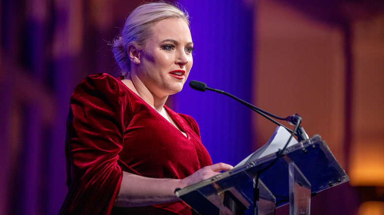 Meghan McCain speaking into a mic