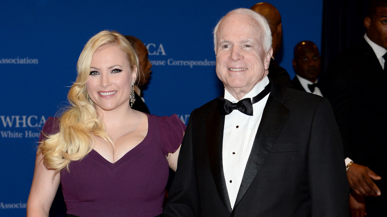 Meghan McCain in purple gown, John McCain wearing tuxedo