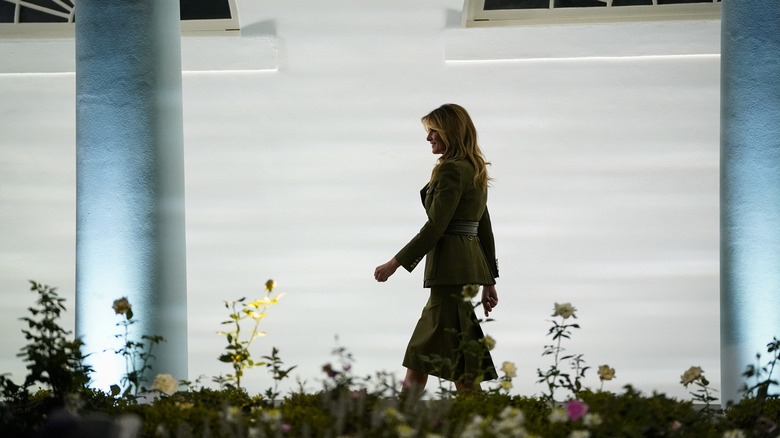 Melania Trump walking through White House Rose Garden