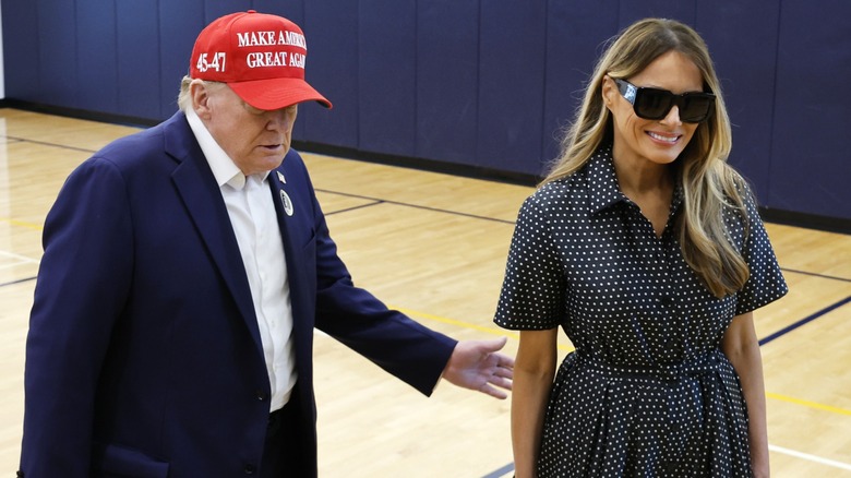 Donald Trump and Melania Trump walking in gymnasium on Election Day 2024