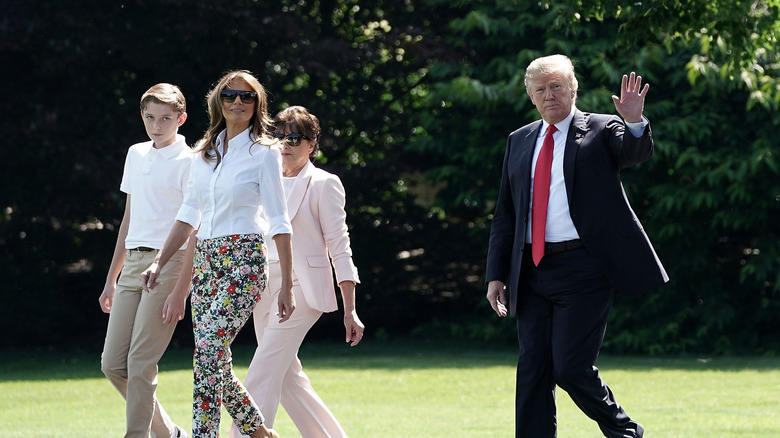 Melania Trump walking with her family