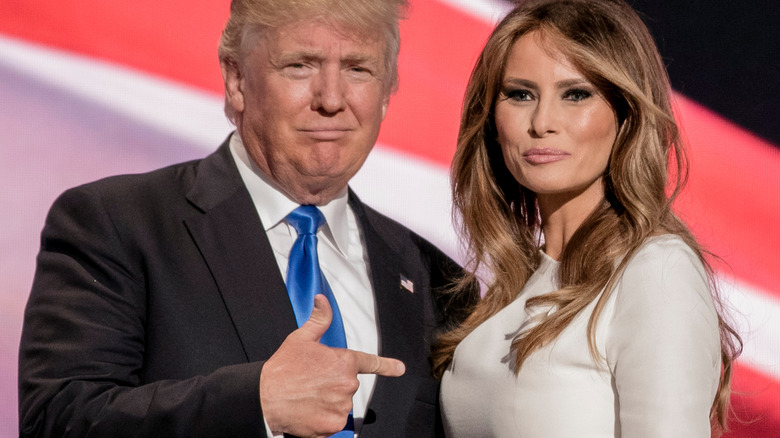 Donald Trump pointing at Melania Trump