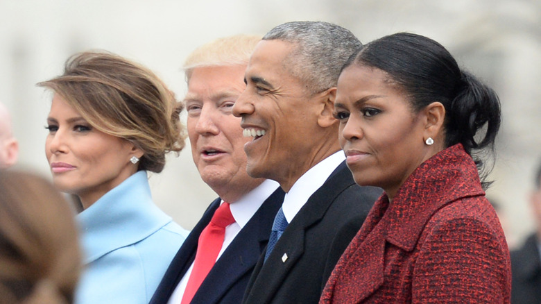 Melania and Donald Trump seated next to Barack and Michelle Obama