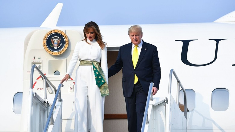 Melania and Donald Trump disembark Air Force One